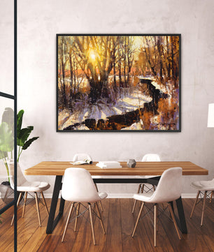 Sunset art winter landscape painting available as canvas print in multiple sizes. Yellow white gold colors. This nature wall art is shown with black frame.