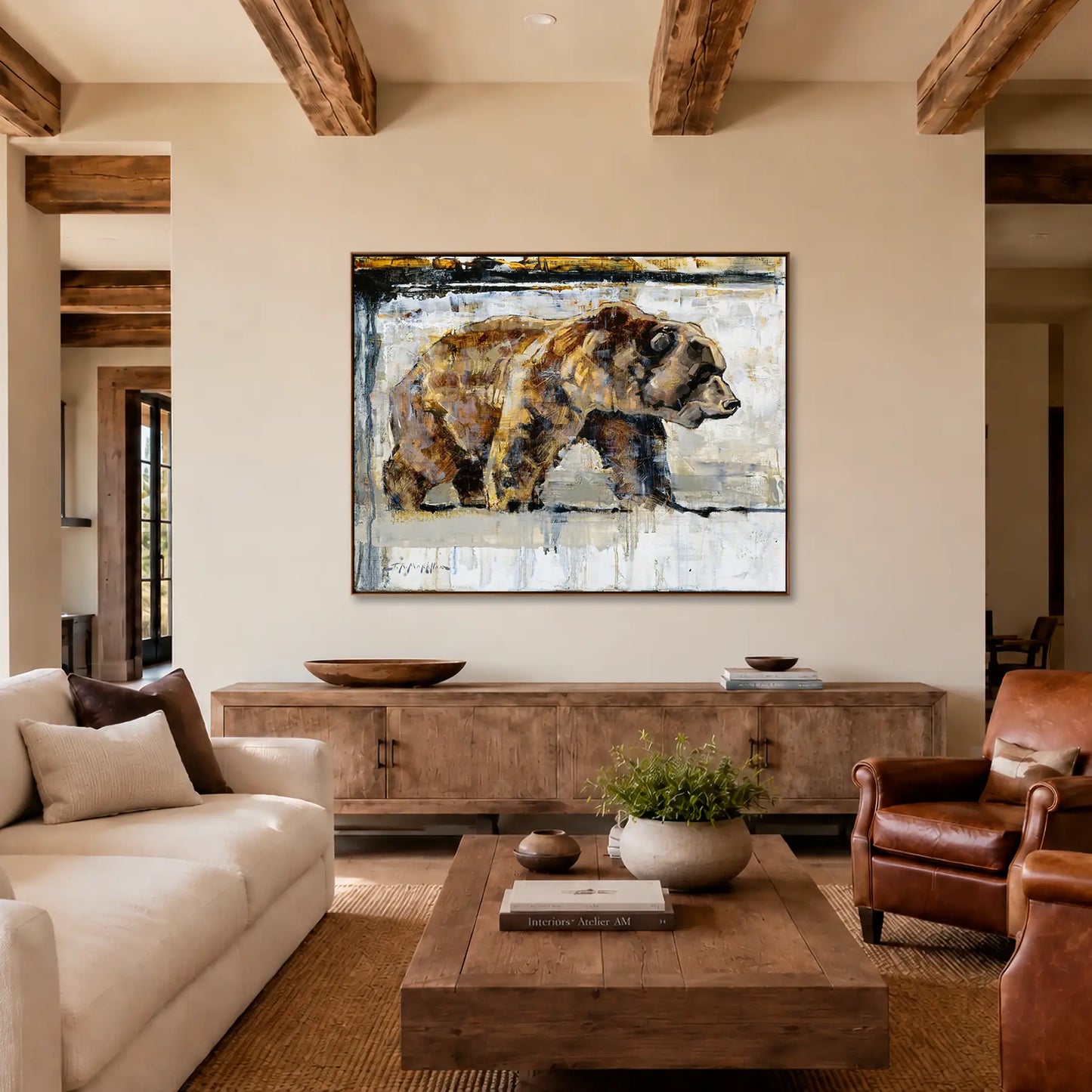 Grizzly bear wall art framed canvas print shown in a modern luxury ranch mountain home decor. Bear art print available in multiple sizes and options.