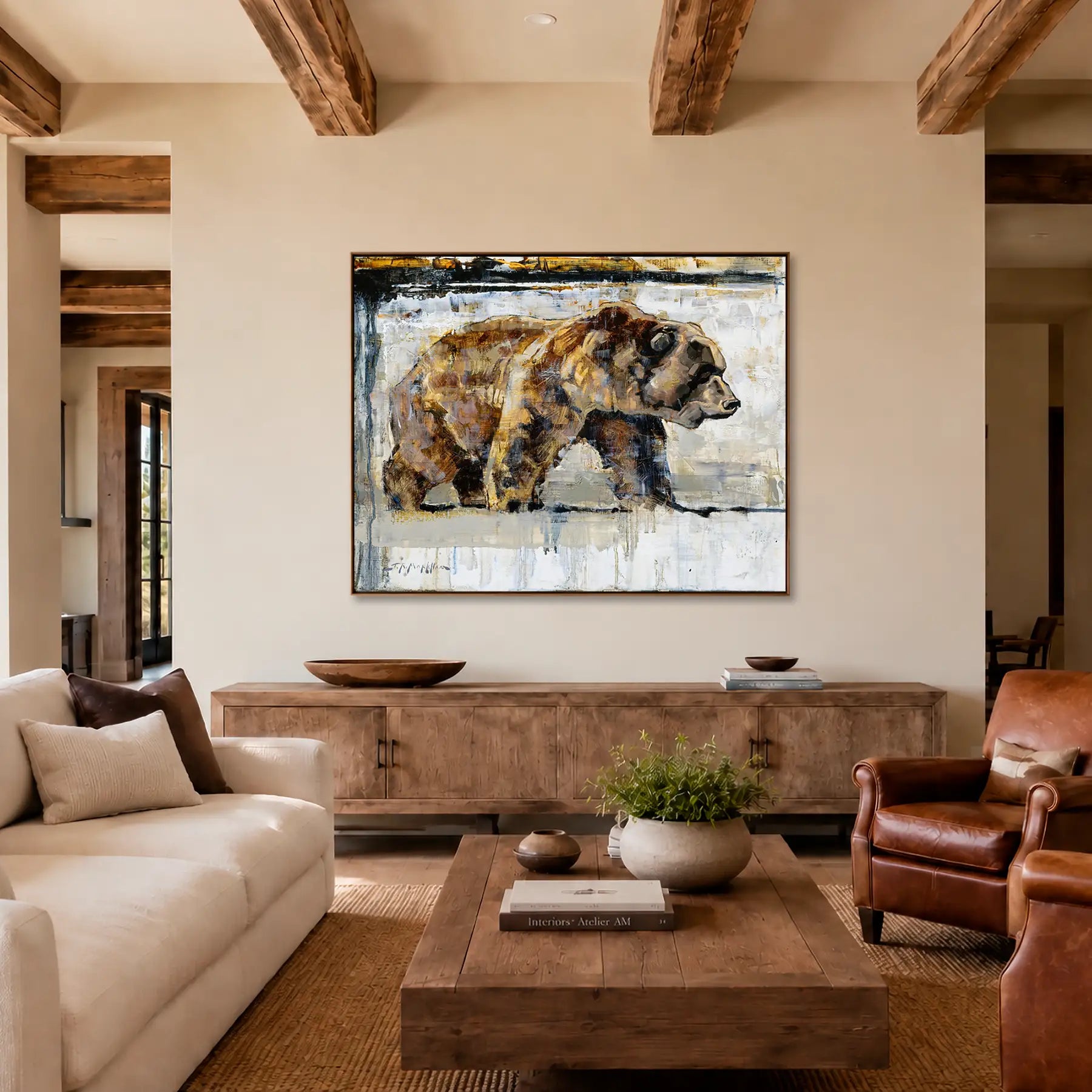 Grizzly bear wall art framed canvas print shown in a modern luxury ranch mountain home decor. Bear art print available in multiple sizes and options.