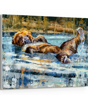 Artwork of a grizzly bear laying in water with a fish. Canvas print from original oil painting by artist Jerry Markham.