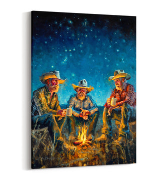 Cowboys around campfire at night under starry sky available as canvas print in multiple sizes. Shown as canvas wrap.