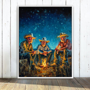 Cowboy art canvas print available in multiple sizes. Cowboys around campfire at night under starry sky. Cowboy wall art print, cowboy print, cowboy decor, western wall art print, western decor. Shown in white frame