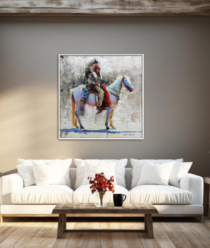 Native american man on horse western wall art canvas print from original oil painting by artist Jerry Markham. Available in multiple sizes and frame options. Shown in white frame.