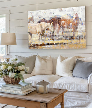 White and brown painting of group of horses available as giclee canvas print in multiple sizes. This horse art shown in modern farmhouse decor.
